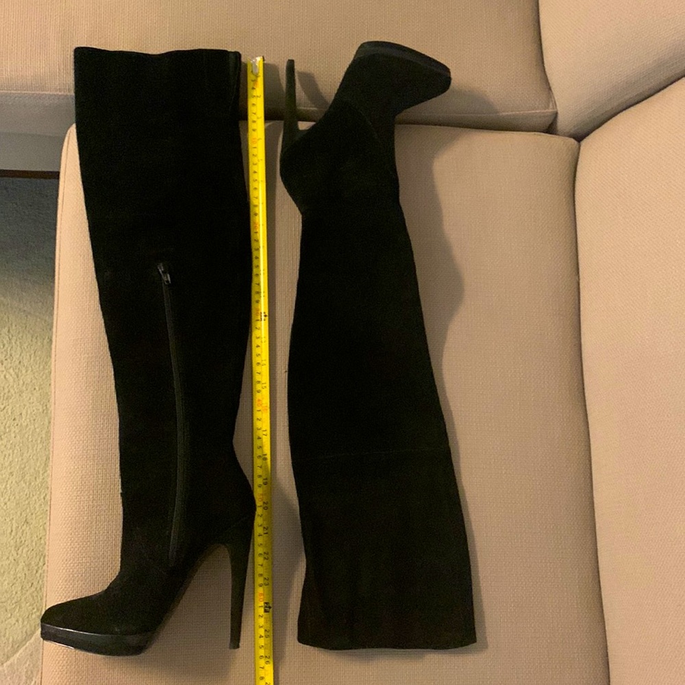 Thigh high heeled boots